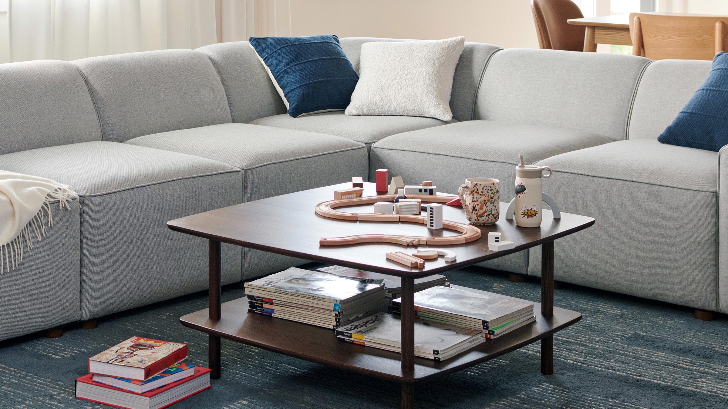 Serif-Walnut-Square-Coffee-Table-Lifestyle-2_f4ccb493-9e6a-4c50-a5ad-b582ec9eaf2f.jpg